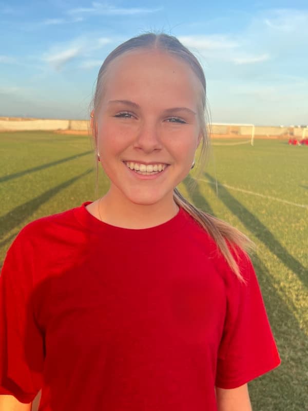 a young athlete smiling